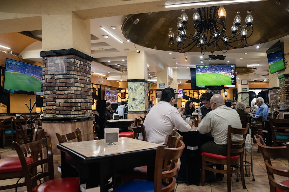 Diners watch sports on the Tudn channel on a television at a restaurant in Mexico City, Mexico, on Monday, July 21, 2025. Grupo Televisa is scheduled to release earnings figures on July 22. Photographer: Mayolo Lopez Gutierrez/Bloomberg Diners watch sports on the Tudn channel on a television at a restaurant in Mexico City, Mexico, on Monday, July 21, 2025. Grupo Televisa is scheduled to release earnings figures on July 22. Photographer: Mayolo Lopez Gutierrez/Bloomberg