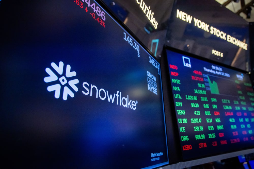 Snowflake Inc. signage on the floor of the New York Stock Exchange (NYSE) in New York, US, on Thursday, April 17, 2025. US stocks traded steady, reversing gains from earlier in the day, as Wall Street traders weighed the latest earnings results and the impact of President Donald Trumps tariffs on Corporate America. Photographer: Michael Nagle/Bloomberg Snowflake Inc. signage on the floor of the New York Stock Exchange (NYSE) in New York, US, on Thursday, April 17, 2025. US stocks traded steady, reversing gains from earlier in the day, as Wall Street traders weighed the latest earnings results and the impact of President Donald Trumps tariffs on Corporate America. Photographer: Michael Nagle/Bloomberg