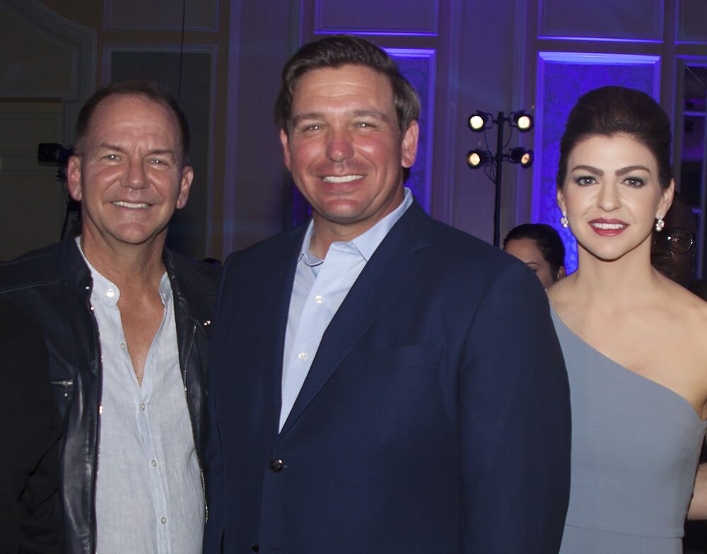 Paul Tudor Jones, Ron y Casey DeSantis Paul Tudor Jones, Ron y Casey DeSantis