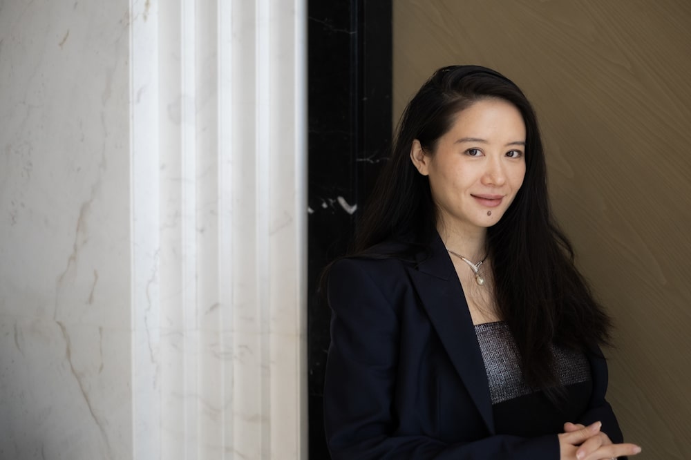 Yi He, codirectora ejecutiva de Binance, posa para una fotografía durante una sesión de retratos. Yi He, codirectora ejecutiva de Binance, posa para una fotografía durante una sesión de retratos.
