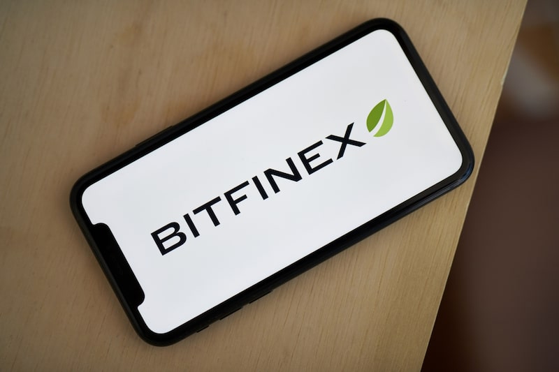 The Bitfinex Logo on a Smartphone. The Bitfinex Logo on a Smartphone.