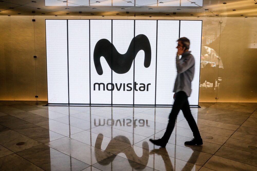 An employee uses a mobile phone inside the Movistar center, operated by Telefonica SA, on Plaza Catalunya in Barcelona, Spain, on Friday, Feb. 14, 2020. Telefonica report their full year results on February 20. Photographer: Angel Garcia/Bloomberg An employee uses a mobile phone inside the Movistar center, operated by Telefonica SA, on Plaza Catalunya in Barcelona, Spain, on Friday, Feb. 14, 2020. Telefonica report their full year results on February 20. Photographer: Angel Garcia/Bloomberg