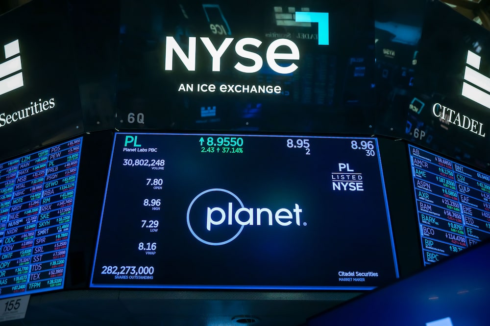 Planet Labs PBC signage on the floor of the New York Stock Exchange (NYSE) in New York, US, on Monday, Sept. 8, 2025. Wall Street piled into bets the Federal Reserve will cut rates next week, with stocks rising on speculation that policy easing at a time when the economy is not in a recession will keep powering Corporate America. Photographer: Michael Nagle/Bloomberg Planet Labs PBC signage on the floor of the New York Stock Exchange (NYSE) in New York, US, on Monday, Sept. 8, 2025. Wall Street piled into bets the Federal Reserve will cut rates next week, with stocks rising on speculation that policy easing at a time when the economy is not in a recession will keep powering Corporate America. Photographer: Michael Nagle/Bloomberg