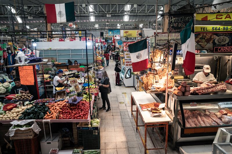 Shoppers browse products at the Mercado de Coyoacan public market in Mexico City, Mexico, on Tuesday, Feb. 4, 2025. The Mexican peso led a rebound in broad currency markets while the dollar all but erases gains on news US tariffs on Mexico would be delayed for one month. Photographer: Mayolo Lopez Gutierrez/ Bloomberg Shoppers browse products at the Mercado de Coyoacan public market in Mexico City, Mexico, on Tuesday, Feb. 4, 2025. The Mexican peso led a rebound in broad currency markets while the dollar all but erases gains on news US tariffs on Mexico would be delayed for one month. Photographer: Mayolo Lopez Gutierrez/ Bloomberg