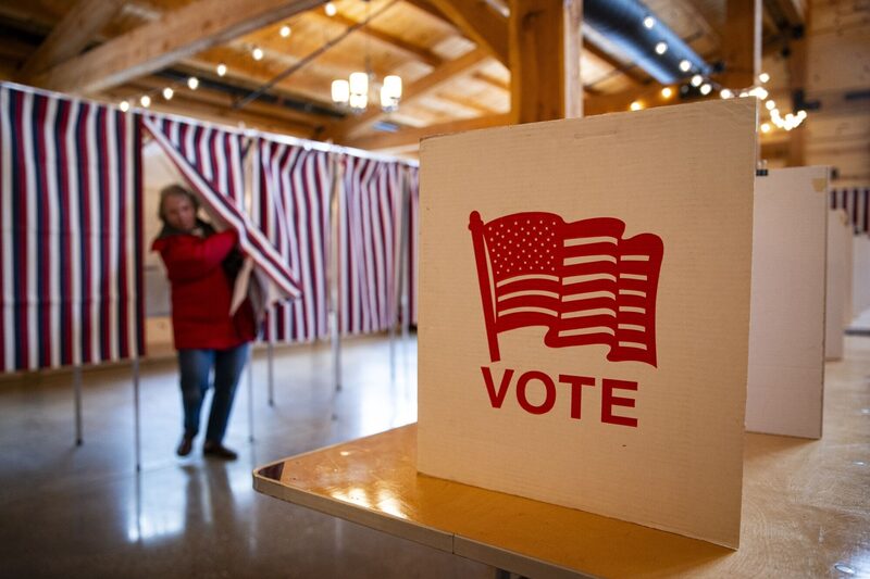 A voter casts their ballot at a polling location in Concord, New Hampshire, US, on Tuesday, Jan. 23, 2024. New Hampshire's primary Tuesday is the stage for a crucial showdown between Donald Trump and Nikki Haley, the last major challenger standing between the former president and the GOP nomination. A voter casts their ballot at a polling location in Concord, New Hampshire, US, on Tuesday, Jan. 23, 2024. New Hampshire's primary Tuesday is the stage for a crucial showdown between Donald Trump and Nikki Haley, the last major challenger standing between the former president and the GOP nomination.