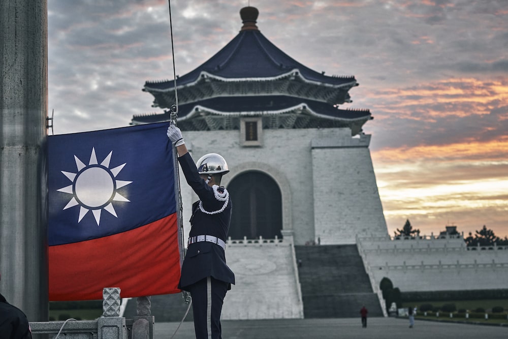 The Guards performing the daily flag raising ceremony at the Chiang Kai Shek memorial hall.December 27th, 2023. Taipei, Taiwan.Photograph by An Rong Xu for Bloomberg The Guards performing the daily flag raising ceremony at the Chiang Kai Shek memorial hall.December 27th, 2023. Taipei, Taiwan.Photograph by An Rong Xu for Bloomberg