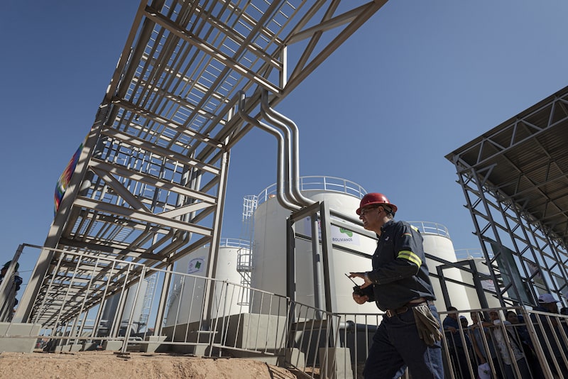 A worker at the Yacimientos Petroliferos Fiscales Bolivianos biodiesel plant near Santa Cruz de la Sierra, Bolivia. Photographer: Marcelo Perez del Carpio/Bloomberg A worker at the Yacimientos Petroliferos Fiscales Bolivianos biodiesel plant near Santa Cruz de la Sierra, Bolivia. Photographer: Marcelo Perez del Carpio/Bloomberg