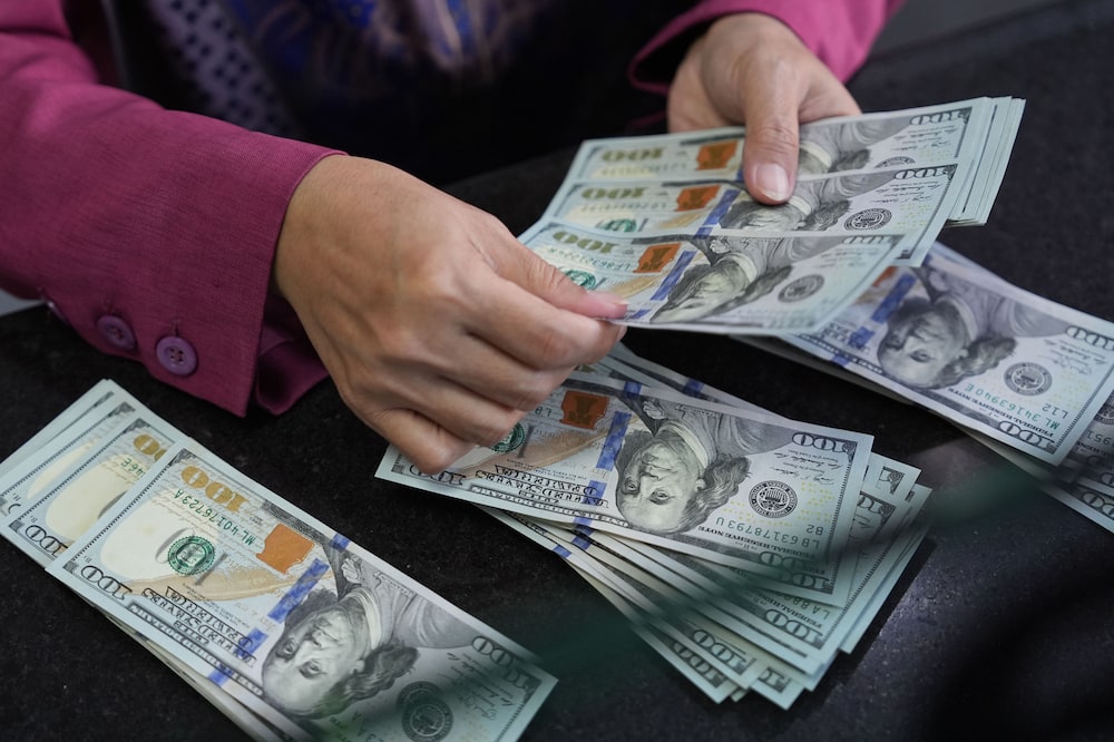 A worker counts US dollar banknotes at a currency exchange office in Jakarta, Indonesia, on Monday, June 8, 2026. Indonesias finance and central bank officials said over the weekend they will boost efforts to stabilize the currency and attract inflows after the nations stocks tumbled at the fastest pace worldwide last week. Photographer: Dimas Ardian/Bloomberg A worker counts US dollar banknotes at a currency exchange office in Jakarta, Indonesia, on Monday, June 8, 2026. Indonesias finance and central bank officials said over the weekend they will boost efforts to stabilize the currency and attract inflows after the nations stocks tumbled at the fastest pace worldwide last week. Photographer: Dimas Ardian/Bloomberg