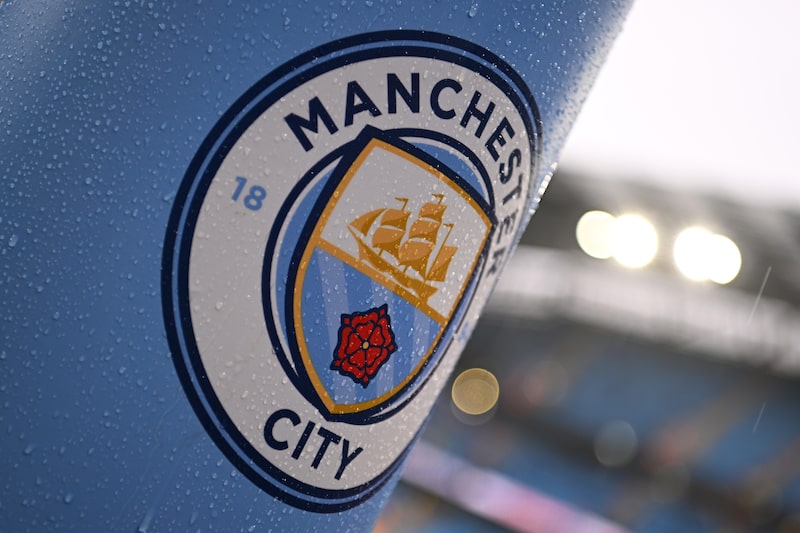 The Manchester City logo. The Manchester City logo.
