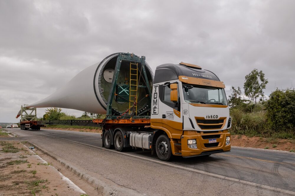 Large trucks haul wind turbine pieces out to the expanding wind farms near Morro do Chapeu, Bahia. Large trucks haul wind turbine pieces out to the expanding wind farms near Morro do Chapeu, Bahia.