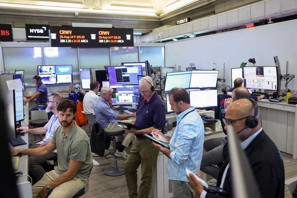 Traders work on the floor of the American Stock Exchange (AMEX) at the New York Stock Exchange (NYSE) in New York, US, on Wednesday, Aug. 12, 2026. US stocks advanced toward all-time highs, led by the technology sector, after a subdued inflation reading helped ease interest-rate hike concerns. Photographer: Michael Nagle/Bloomberg Traders work on the floor of the American Stock Exchange (AMEX) at the New York Stock Exchange (NYSE) in New York, US, on Wednesday, Aug. 12, 2026. US stocks advanced toward all-time highs, led by the technology sector, after a subdued inflation reading helped ease interest-rate hike concerns. Photographer: Michael Nagle/Bloomberg