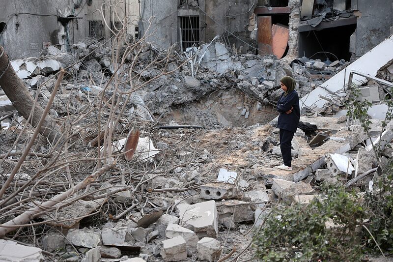 A woman stands amid the rubble in the aftermath of an Israeli strike on the Al-Ahli hospital, also known as the Baptist or Ahli Arab hospital, in Gaza City on April 13, 2025. Gaza's civil defence agency said an Israeli airstrike destroyed parts of the hospital early on April 13, after Israel seized a corridor in the war-battered Palestinian territory and said it planned to expand its military offensive. (Photo by Omar AL-QATTAA / AFP) (Photo by OMAR AL-QATTAA/AFP via Getty Images) A woman stands amid the rubble in the aftermath of an Israeli strike on the Al-Ahli hospital, also known as the Baptist or Ahli Arab hospital, in Gaza City on April 13, 2025. Gaza's civil defence agency said an Israeli airstrike destroyed parts of the hospital early on April 13, after Israel seized a corridor in the war-battered Palestinian territory and said it planned to expand its military offensive. (Photo by Omar AL-QATTAA / AFP) (Photo by OMAR AL-QATTAA/AFP via Getty Images)