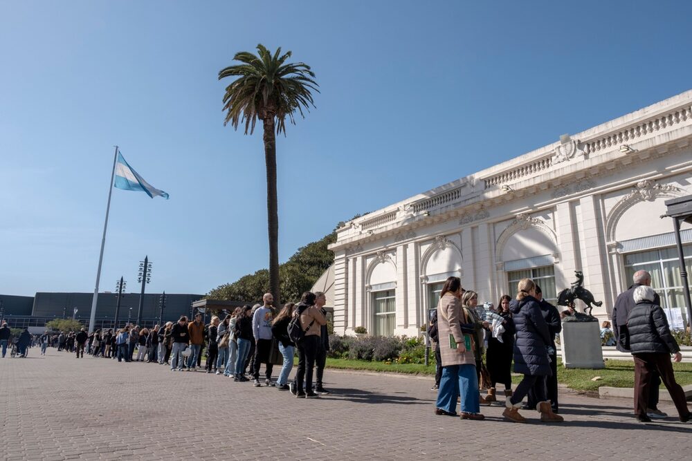 Voters wait in line to cast a ballot at a polling station during the national primary election in Buenos Aires on Aug. 13. Voters wait in line to cast a ballot at a polling station during the national primary election in Buenos Aires on Aug. 13.