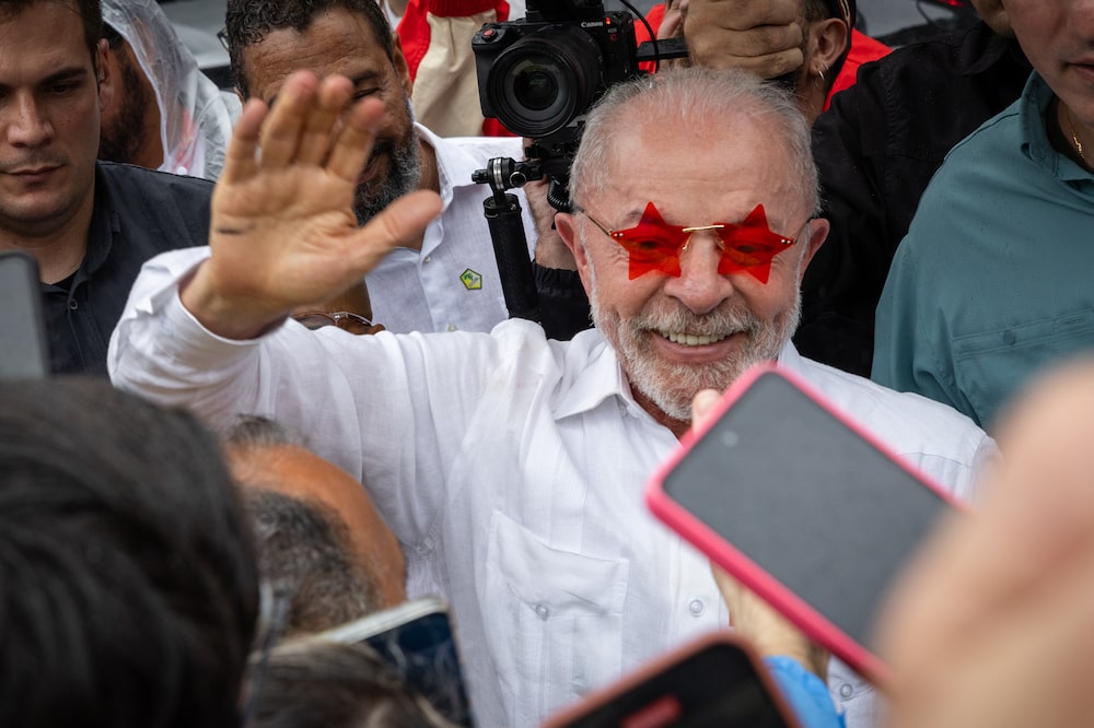 Luiz Inacio Lula da Silva, Brazil's president, greets supporters after casting a ballot at a polling station during the runoff election in Sao Bernardo do Campo, Sao Paulo state, Brazil, on Sunday, Oct. 25, 2026. Brazilians to the ballot box in a runoff election in which Flavio Bolsonaro and President Lula were statistically tied in a poll released on the eve of the vote. Photographer: Maira Erlich/Bloomberg Luiz Inacio Lula da Silva, Brazil's president, greets supporters after casting a ballot at a polling station during the runoff election in Sao Bernardo do Campo, Sao Paulo state, Brazil, on Sunday, Oct. 25, 2026. Brazilians to the ballot box in a runoff election in which Flavio Bolsonaro and President Lula were statistically tied in a poll released on the eve of the vote. Photographer: Maira Erlich/Bloomberg