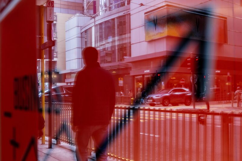 A pedestrian reflected in a sign in Hong Kong, China, on Tuesday, Jan. 23, 2024. Asian stocks advanced, led by Hong Kong, on news that Chinese authorities are considering a rescue package to stem an extended market slump. Photographer: Paul Yeung/Bloomberg A pedestrian reflected in a sign in Hong Kong, China, on Tuesday, Jan. 23, 2024. Asian stocks advanced, led by Hong Kong, on news that Chinese authorities are considering a rescue package to stem an extended market slump. Photographer: Paul Yeung/Bloomberg