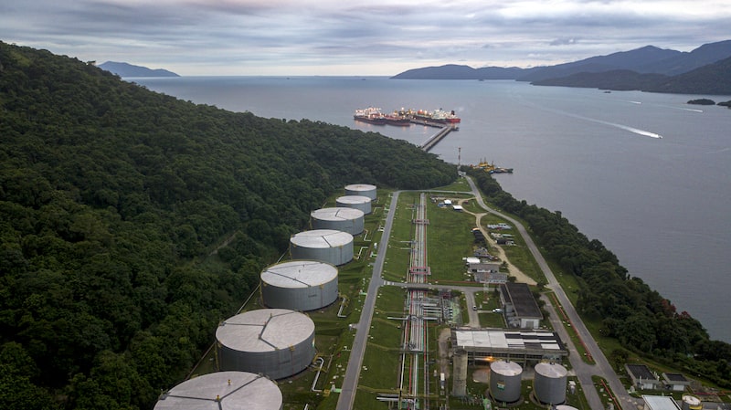 Oil storage tanks stand at the Petroleo Brasileiro SA (Petrobras) Angra dos Reis fuel terminal in this aerial photograph taken above Angra dos Reis, Brazil, on Thursday, April 23, 2020. The state-owned company has cut their diesel and gasoline prices, along with their oil production, as chronic oversupply overwhelms the world crude tanks, pipelines and supertankers. Photographer: Dado Galdieri/Bloomberg Oil storage tanks stand at the Petroleo Brasileiro SA (Petrobras) Angra dos Reis fuel terminal in this aerial photograph taken above Angra dos Reis, Brazil, on Thursday, April 23, 2020. The state-owned company has cut their diesel and gasoline prices, along with their oil production, as chronic oversupply overwhelms the world crude tanks, pipelines and supertankers. Photographer: Dado Galdieri/Bloomberg