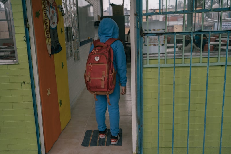 A students wipes his shoes on a sanitizing rug before entering a classroom at an elementary school on the first day of classes in Mexico City, Mexico, on Monday, Aug. 30, 2021. The new school year begins at a time when Mexico is in the midst of its third wave of COVID-19 infections and has recorded more than 380,000 COVID-19 confirmed deaths, reports ABC News. Photographer: Luis Antonio Rojas/Bloomberg A students wipes his shoes on a sanitizing rug before entering a classroom at an elementary school on the first day of classes in Mexico City, Mexico, on Monday, Aug. 30, 2021. The new school year begins at a time when Mexico is in the midst of its third wave of COVID-19 infections and has recorded more than 380,000 COVID-19 confirmed deaths, reports ABC News. Photographer: Luis Antonio Rojas/Bloomberg