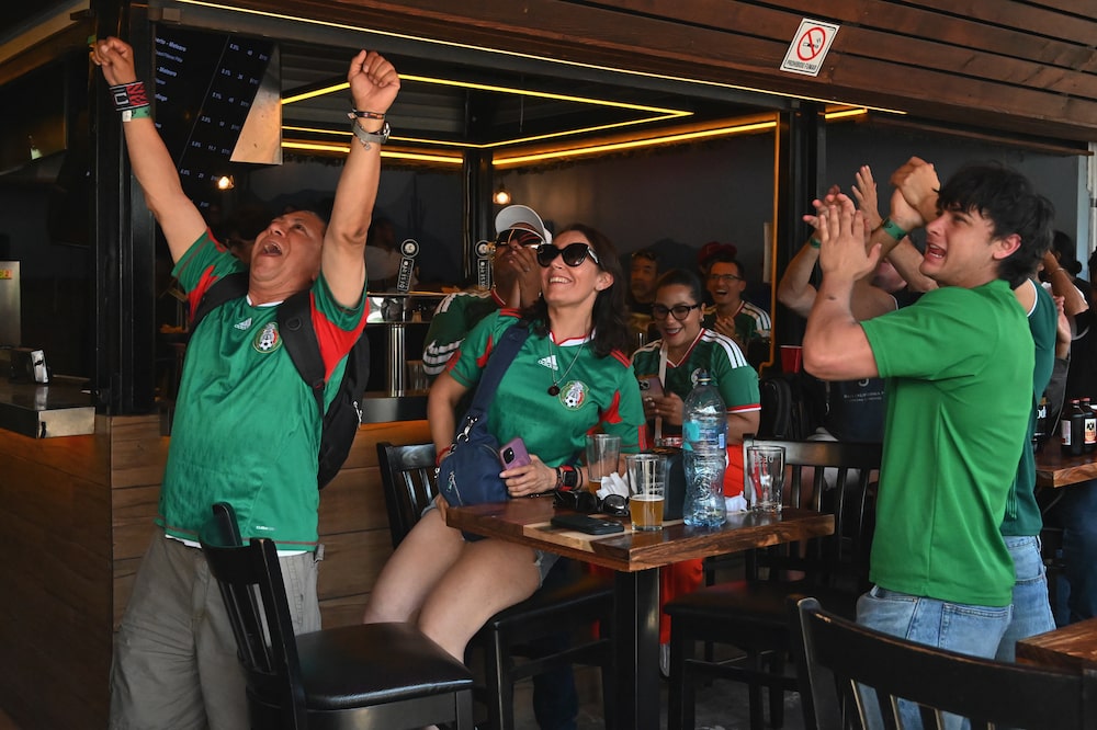 Fans watch the opening match and cheer for Mexico during a World Cup 2026 watch party in Tijuana, Mexico, on Thursday, June 11, 2026. Mexico hosts South Africa for the World Cup opening match Thursday at the historic Estadio Azteca in Mexico City. Photographer: Carlos Moreno/Bloomberg Fans watch the opening match and cheer for Mexico during a World Cup 2026 watch party in Tijuana, Mexico, on Thursday, June 11, 2026. Mexico hosts South Africa for the World Cup opening match Thursday at the historic Estadio Azteca in Mexico City. Photographer: Carlos Moreno/Bloomberg