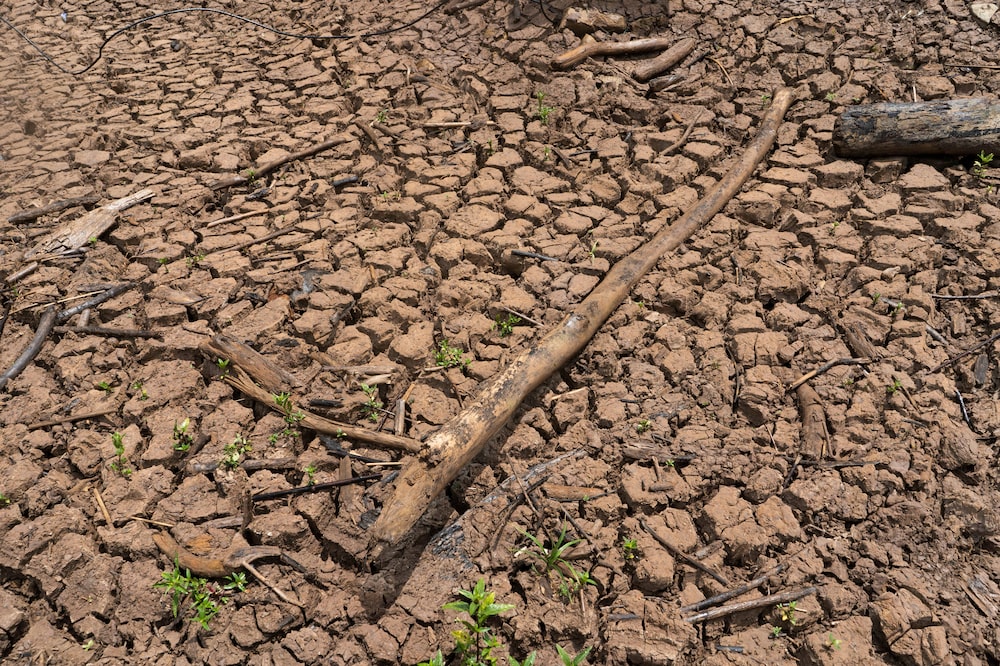 Cracked ground at the Sogamoso hydroelectric dam near Bucaramanga, Santander department, Colombia, on Sunday, April 21, 2024. The average reservoir levels across Colombia have fallen below 29% of total capacity, just above the critical level of 27% which could trigger power outages. Photographer: Natalia Ortiz Mantilla/Bloomberg Cracked ground at the Sogamoso hydroelectric dam near Bucaramanga, Santander department, Colombia, on Sunday, April 21, 2024. The average reservoir levels across Colombia have fallen below 29% of total capacity, just above the critical level of 27% which could trigger power outages. Photographer: Natalia Ortiz Mantilla/Bloomberg