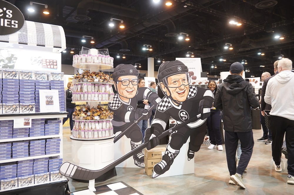 Cutouts depicting former Berkshire Hathaway CEO Warren Buffet and Berkshire Hathaway CEO Greg Abel at the See's Candies booth inside the convention hall during a shareholders shopping day ahead of the Berkshire Hathaway annual shareholders meeting in Omaha, Nebraska, US, on Friday, May 1, 2026. CEO Greg Abel has pledged to follow Buffett's approach to investing and managing risk - Saturday's meeting is branded with the slogan "The Legacy Continues." Cutouts depicting former Berkshire Hathaway CEO Warren Buffet and Berkshire Hathaway CEO Greg Abel at the See's Candies booth inside the convention hall during a shareholders shopping day ahead of the Berkshire Hathaway annual shareholders meeting in Omaha, Nebraska, US, on Friday, May 1, 2026. CEO Greg Abel has pledged to follow Buffett's approach to investing and managing risk - Saturday's meeting is branded with the slogan "The Legacy Continues."