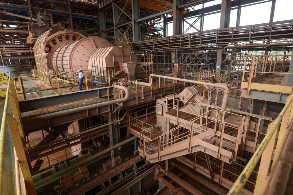 A worker checks a machine where bauxite stones are washed and grinded at the Paragominas bauxite mine, co-owned by Norsk Hydro and Vale SA, in Paragominas, Brazil, on Wednesday, April 13, 2016. Bauxite is extracted from the clay soil, crushed and transported via pipeline to Barcarena for refining and shipment to aluminium producers in Brazil and internationally. Photographer: Paulo Fridman/Bloomberg A worker checks a machine where bauxite stones are washed and grinded at the Paragominas bauxite mine, co-owned by Norsk Hydro and Vale SA, in Paragominas, Brazil, on Wednesday, April 13, 2016. Bauxite is extracted from the clay soil, crushed and transported via pipeline to Barcarena for refining and shipment to aluminium producers in Brazil and internationally. Photographer: Paulo Fridman/Bloomberg