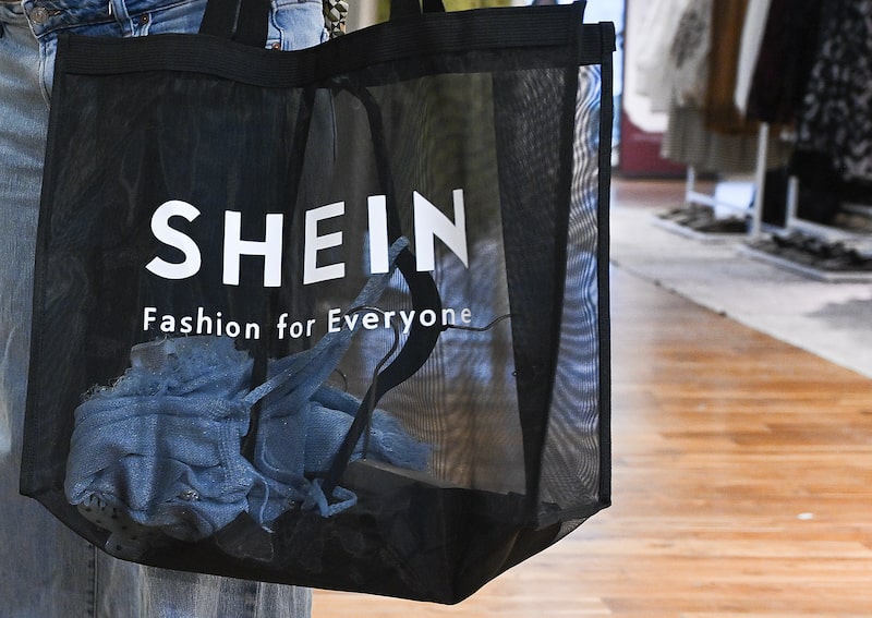 A person shops at a Shein Fall/Winter 2025 pop-up during a media preview event in Montreal, Quebec, Canada A person shops at a Shein Fall/Winter 2025 pop-up during a media preview event in Montreal, Quebec, Canada