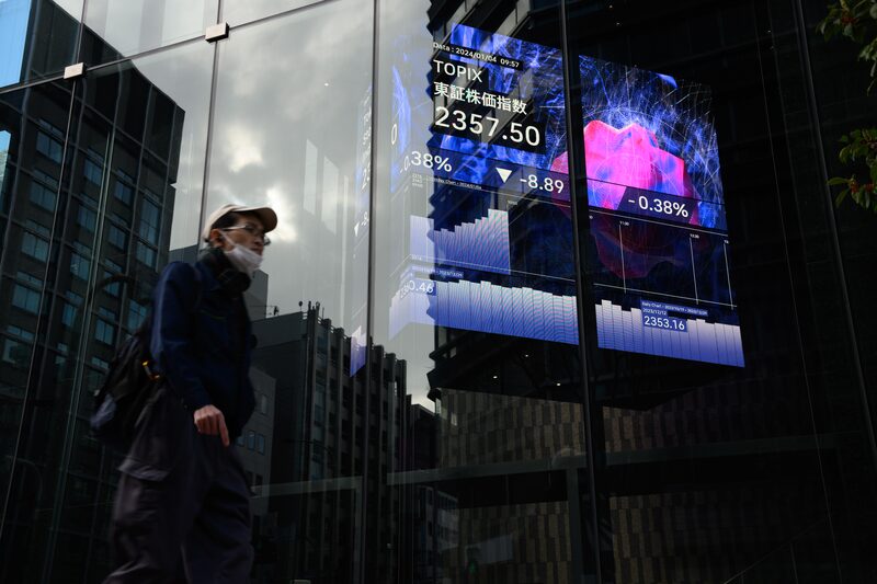 An electronic stock board displayed inside the Kabuto One building in Tokyo, Japan, on Thursday, Jan. 4, 2024. Japanese stocks fall on their first trading day of the year after US shares slumped on Federal Reserve meeting minutes indicating interest rates will remain elevated for longer, and as a powerful earthquake in Japans northwest coast on New Years Day weighs on investor sentiment. Photographer: Akio Kon/Bloomberg An electronic stock board displayed inside the Kabuto One building in Tokyo, Japan, on Thursday, Jan. 4, 2024. Japanese stocks fall on their first trading day of the year after US shares slumped on Federal Reserve meeting minutes indicating interest rates will remain elevated for longer, and as a powerful earthquake in Japans northwest coast on New Years Day weighs on investor sentiment. Photographer: Akio Kon/Bloomberg