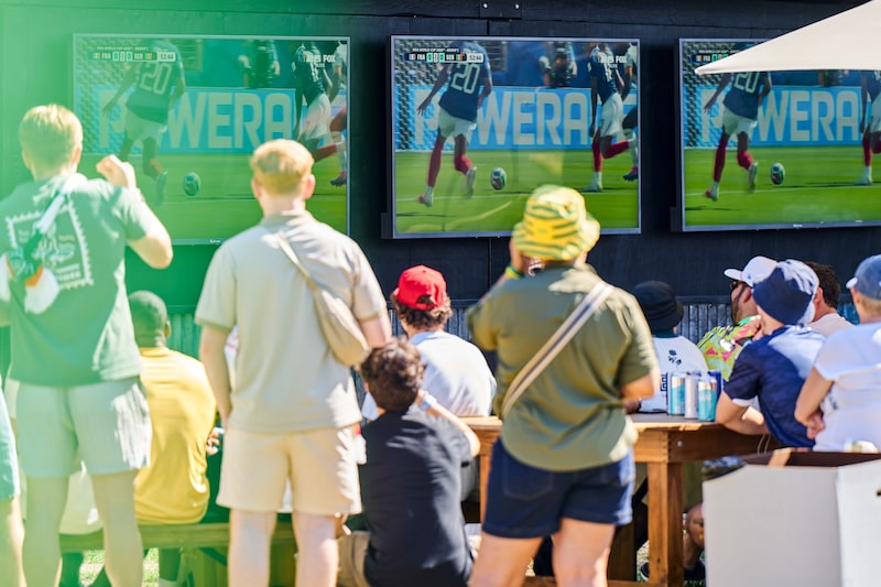 Fans gather to watch a FIFA World Cup 2026 Group I match between France and Senegal at MetLife Stadium, during a watch party hosted by Adidas at Brooklyn Bridge Park in the Brooklyn borough of New York, US, on Tuesday, June 16, 2026. The World Cup is back in the US for the first time since 1994 in its biggest version yet, encompassing 48 teams and 104 matches that are also being played in neighboring Canada and Mexico. Photographer: Bing Guan/Bloomberg Fans gather to watch a FIFA World Cup 2026 Group I match between France and Senegal at MetLife Stadium, during a watch party hosted by Adidas at Brooklyn Bridge Park in the Brooklyn borough of New York, US, on Tuesday, June 16, 2026. The World Cup is back in the US for the first time since 1994 in its biggest version yet, encompassing 48 teams and 104 matches that are also being played in neighboring Canada and Mexico. Photographer: Bing Guan/Bloomberg