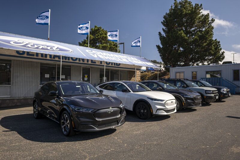 Ford Mustang Mach-E vehicles at a Ford dealership in Colma, Calif. Ford Mustang Mach-E vehicles at a Ford dealership in Colma, Calif.