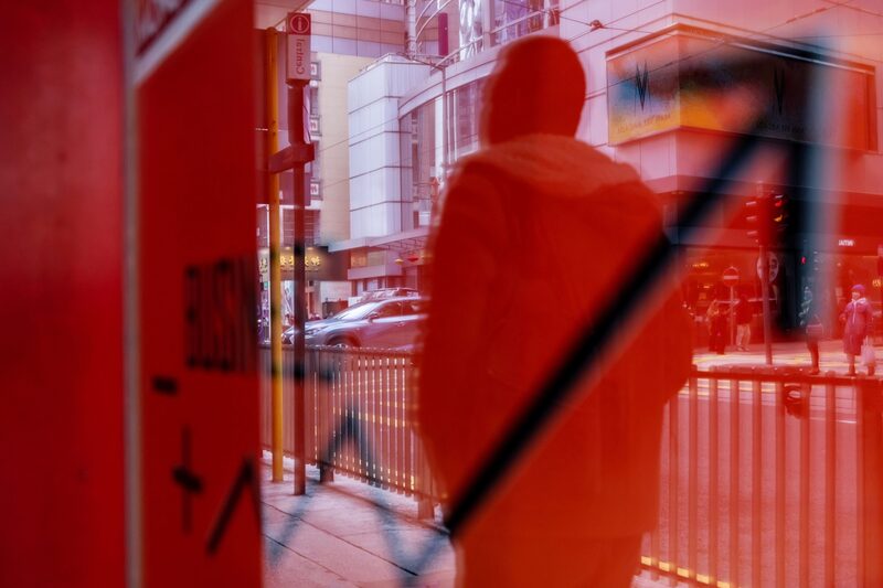 A pedestrian reflected in a sign in Hong Kong, China, on Tuesday, Jan. 23, 2024. Asian stocks advanced, led by Hong Kong, on news that Chinese authorities are considering a rescue package to stem an extended market slump. Photographer: Paul Yeung/Bloomberg A pedestrian reflected in a sign in Hong Kong, China, on Tuesday, Jan. 23, 2024. Asian stocks advanced, led by Hong Kong, on news that Chinese authorities are considering a rescue package to stem an extended market slump. Photographer: Paul Yeung/Bloomberg