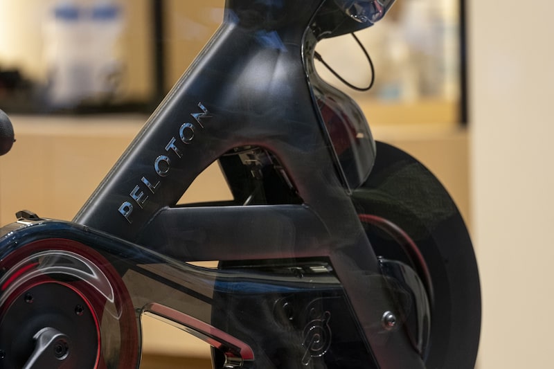A Peloton exercise bike. A Peloton exercise bike.
