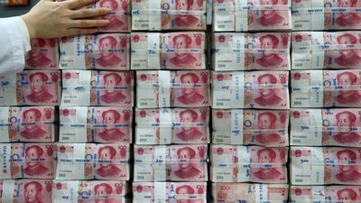 Com dólar em falta, Argentina permite aos bancos abertura de contas em yuan Com dólar em falta, Argentina permite aos bancos abertura de contas em yuan