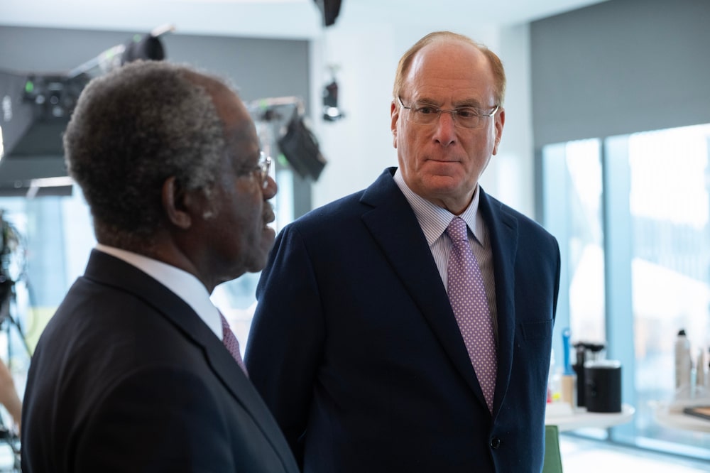 Larry Fink, chairman and chief executive officer of BlackRock Inc., right, and Adebayo Ogunlesi, chairman and chief executive officer of Global Infrastructure Partners (GIP), speak before a Bloomberg Television interview in New York, US, on Friday, Jan. 12, 2024. BlackRock Inc. agreed to buy Global Infrastructure Partners for about $12.5 billion, vaulting the world's biggest money manager into the top ranks of investors that make long-term bets on energy, transportation and digital infrastructure. Photographer: Victor J. Blue/Bloomberg Larry Fink, chairman and chief executive officer of BlackRock Inc., right, and Adebayo Ogunlesi, chairman and chief executive officer of Global Infrastructure Partners (GIP), speak before a Bloomberg Television interview in New York, US, on Friday, Jan. 12, 2024. BlackRock Inc. agreed to buy Global Infrastructure Partners for about $12.5 billion, vaulting the world's biggest money manager into the top ranks of investors that make long-term bets on energy, transportation and digital infrastructure. Photographer: Victor J. Blue/Bloomberg