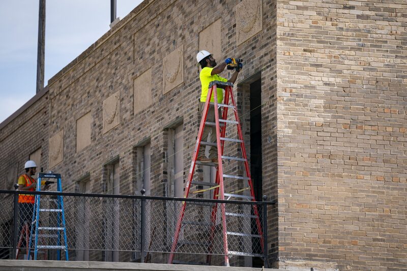 Construction workers drill into a building being renovated in the Union Market district in Washington, DC, US, on Friday, Sept. 8, 2023. US employment gains will slow significantly and be more concentrated across few sectors in the decade through 2032 as population growth moderates, fresh government estimates show. Photographer: Al Drago/Bloomberg Construction workers drill into a building being renovated in the Union Market district in Washington, DC, US, on Friday, Sept. 8, 2023. US employment gains will slow significantly and be more concentrated across few sectors in the decade through 2032 as population growth moderates, fresh government estimates show. Photographer: Al Drago/Bloomberg