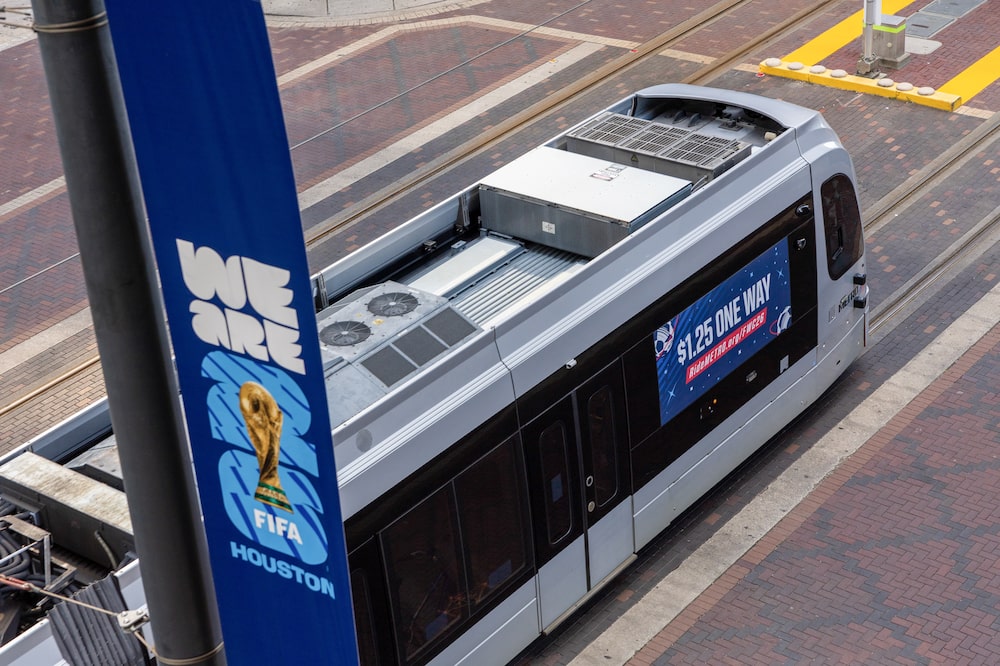 A METRORail Red Line train near signage for the 2026 FIFA World Cup in Houston, Texas, US, on Monday, May 25, 2026. Houston's first World Cup match is scheduled for June 14, when the city will host Germany versus Curacao. Photographer: Antranik Tavitian/Bloomberg A METRORail Red Line train near signage for the 2026 FIFA World Cup in Houston, Texas, US, on Monday, May 25, 2026. Houston's first World Cup match is scheduled for June 14, when the city will host Germany versus Curacao. Photographer: Antranik Tavitian/Bloomberg