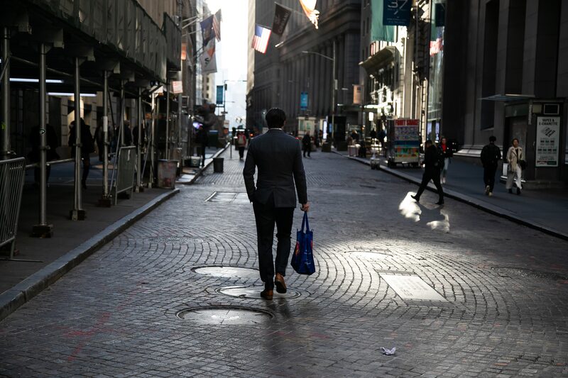 A pedestrian on Wall Street near the New York Stock Exchange (NYSE) in New York, US, on Tuesday, Oct. 31, 2023. Wall Street is heading toward the end of a jittery month, with stocks fluctuating and bonds mixed as traders took the latest economic data in stride on the eve of the Federal Reserve decision. A pedestrian on Wall Street near the New York Stock Exchange (NYSE) in New York, US, on Tuesday, Oct. 31, 2023. Wall Street is heading toward the end of a jittery month, with stocks fluctuating and bonds mixed as traders took the latest economic data in stride on the eve of the Federal Reserve decision.