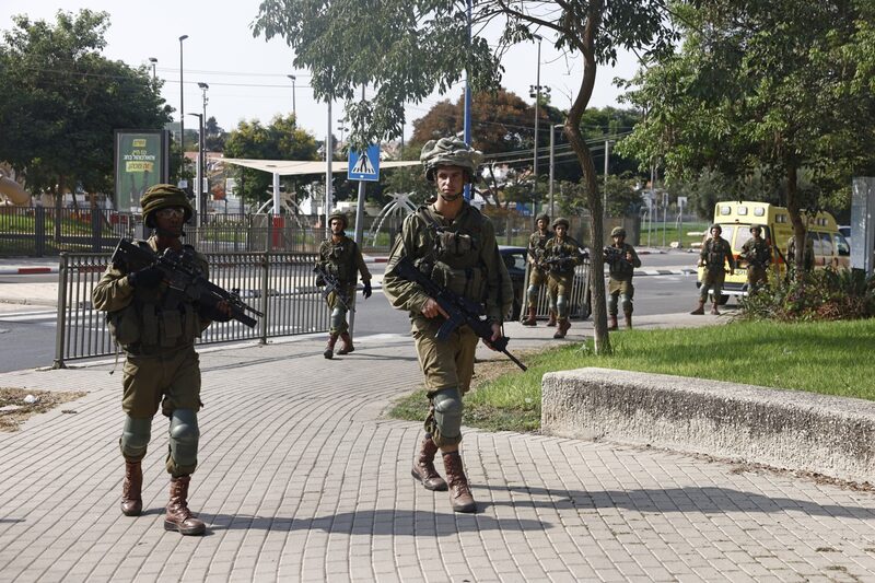 Israeli soldiers patrol a street on foot in Sderot, Israel, on Sunday, Oct. 8, 2023. Fighting continued in southern Israel for a second day as Israeli Defence Forces sought to regain control of areas infiltrated yesterday by militants from the Gaza Strip. Israeli soldiers patrol a street on foot in Sderot, Israel, on Sunday, Oct. 8, 2023. Fighting continued in southern Israel for a second day as Israeli Defence Forces sought to regain control of areas infiltrated yesterday by militants from the Gaza Strip.