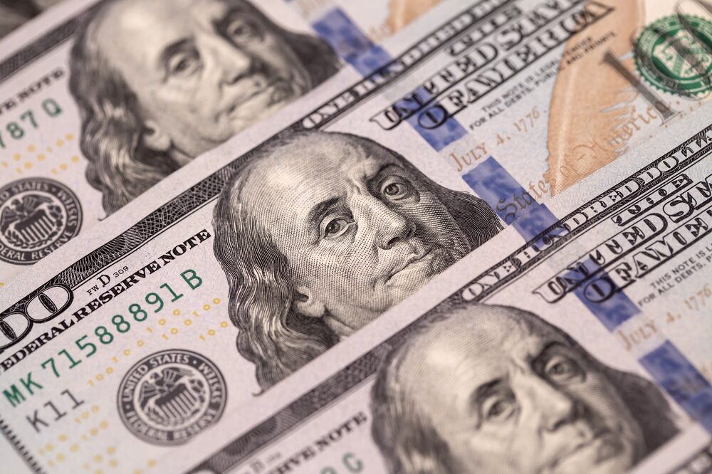 U.S. one-hundred dollar banknotes are arranged for a photograph in Hong Kong, China, on Thursday, April 23, 2020. The Hong Kong Monetary Authority intervened for a third straight day this week to defend its currency peg as the local dollar touched the strong end of its trading band. Photographer: Paul Yeung/Bloomberg U.S. one-hundred dollar banknotes are arranged for a photograph in Hong Kong, China, on Thursday, April 23, 2020. The Hong Kong Monetary Authority intervened for a third straight day this week to defend its currency peg as the local dollar touched the strong end of its trading band. Photographer: Paul Yeung/Bloomberg