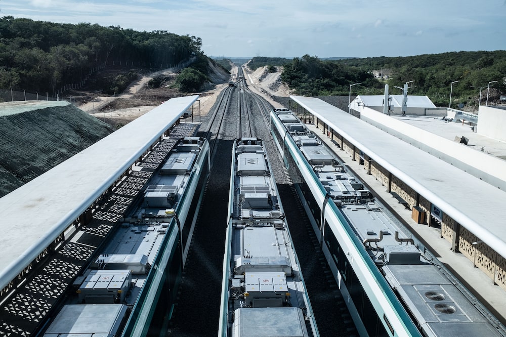 Train cars at the inauguration of the Maya Train line in Campeche, Mexico, on Friday, Dec. 15, 2023. Mexican President AMLOs flagship works have significantly exceed their original budget and cost increases have become a constant in the construction of the Maya Train, which has exceeded the cost of the Dos Bocas refinery, according to the most recent estimates released by the Mexican government. Photographer: Koral Carballo/Bloomberg Train cars at the inauguration of the Maya Train line in Campeche, Mexico, on Friday, Dec. 15, 2023. Mexican President AMLOs flagship works have significantly exceed their original budget and cost increases have become a constant in the construction of the Maya Train, which has exceeded the cost of the Dos Bocas refinery, according to the most recent estimates released by the Mexican government. Photographer: Koral Carballo/Bloomberg
