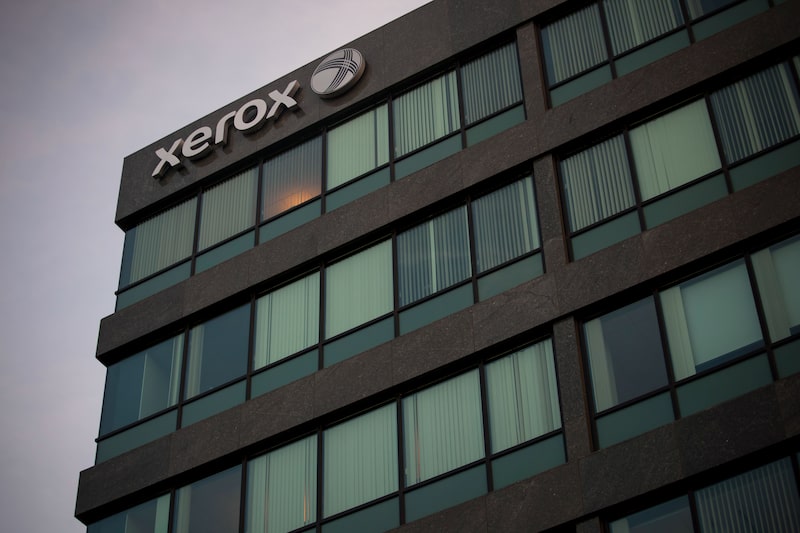 Signage is displayed on the exterior of Xerox Corp. headquarters in Norwalk, Connecticut, U.S., on Thursday, Jan. 5, 2017. On Tuesday shares of Xerox, the global business service and document technology company, spiked about 15.7% during afternoon trading, as it completed a spinoff of its former business process services unit, Conduent. Photographer: Michael Nagle/Bloomberg Signage is displayed on the exterior of Xerox Corp. headquarters in Norwalk, Connecticut, U.S., on Thursday, Jan. 5, 2017. On Tuesday shares of Xerox, the global business service and document technology company, spiked about 15.7% during afternoon trading, as it completed a spinoff of its former business process services unit, Conduent. Photographer: Michael Nagle/Bloomberg