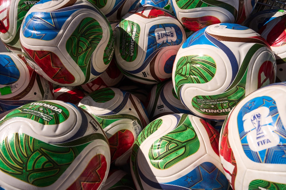 FIFA World Cup 2026 replica match balls for sale at a watch party hosted by Adidas at Brooklyn Bridge Park in the Brooklyn borough of New York, US, on Tuesday, June 16, 2026. The World Cup is back in the US for the first time since 1994 in its biggest version yet, encompassing 48 teams and 104 matches that are also being played in neighboring Canada and Mexico. Photographer: Bing Guan/Bloomberg FIFA World Cup 2026 replica match balls for sale at a watch party hosted by Adidas at Brooklyn Bridge Park in the Brooklyn borough of New York, US, on Tuesday, June 16, 2026. The World Cup is back in the US for the first time since 1994 in its biggest version yet, encompassing 48 teams and 104 matches that are also being played in neighboring Canada and Mexico. Photographer: Bing Guan/Bloomberg