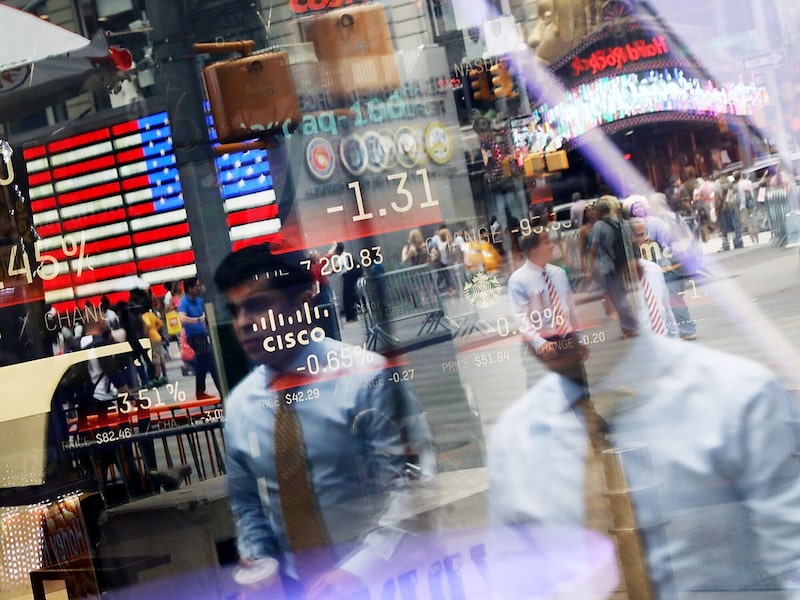 NEW YORK, NY - JULY 30: People are reflected in the window of the Nasdaq MarketSite in Times Square on July 30, 2018 in New York City. As technology stocks continued their slide on Monday, the Nasdaq Composite dropped 1.1 percent in afternoon trading with shares of Facebook, Netflix, Amazon and Google-parent Alphabet all declining. (Photo by Spencer Platt/Getty Images) Photographer: Spencer Platt/Getty Images North America NEW YORK, NY - JULY 30: People are reflected in the window of the Nasdaq MarketSite in Times Square on July 30, 2018 in New York City. As technology stocks continued their slide on Monday, the Nasdaq Composite dropped 1.1 percent in afternoon trading with shares of Facebook, Netflix, Amazon and Google-parent Alphabet all declining. (Photo by Spencer Platt/Getty Images) Photographer: Spencer Platt/Getty Images North America