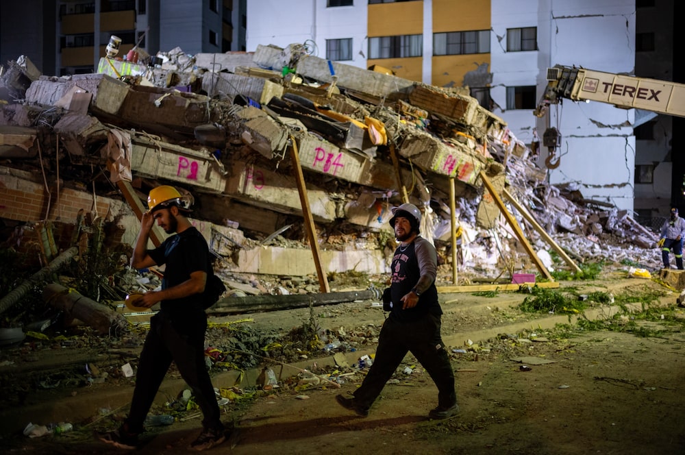 Los equipos de rescate retiran los escombros del edificio Cantabria en Cali, Colombia, el 13 de agosto. Fotógrafa: Nathalia Angarita/Bloomberg Los equipos de rescate retiran los escombros del edificio Cantabria en Cali, Colombia, el 13 de agosto. Fotógrafa: Nathalia Angarita/Bloomberg
