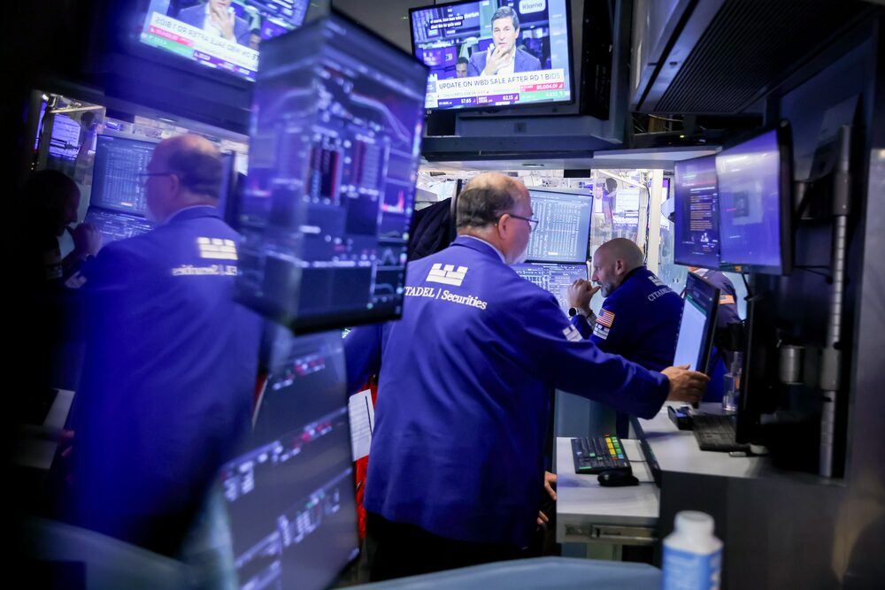 Traders At The New York Stock Exchange As Stocks Stage Comeback At The End Of A Jittery Week Traders At The New York Stock Exchange As Stocks Stage Comeback At The End Of A Jittery Week