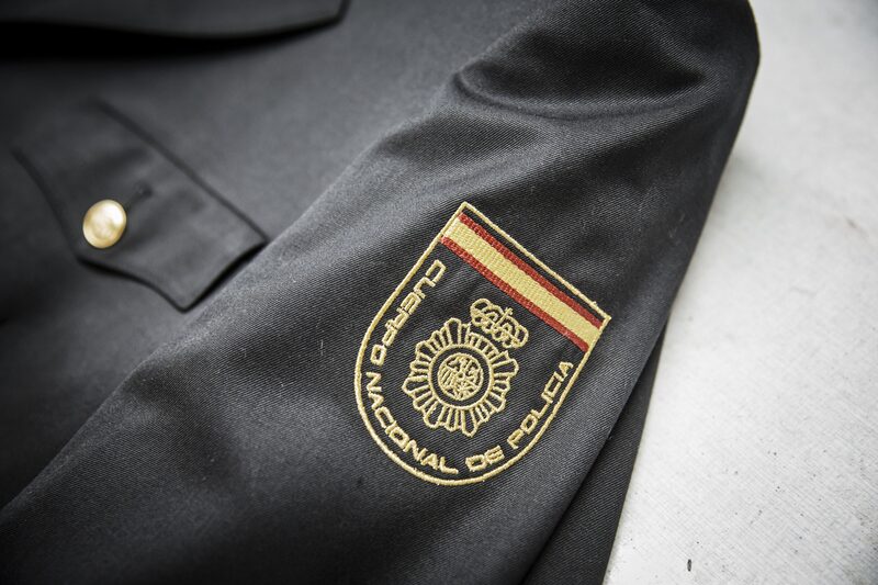 The logo of the Cuerpo Nacional de Policia, the Spanish civilian police force, is displayed on a jacket at the Shandong Ruyi Technology Group in Jining, China, on Monday, May 30, 2016. Shandong got a boost in the past from its proximity to Japan and South Korea, the source of much of its early investment. Now, it's trying to maintain the high growth rate needed to make the same leap they did: from middle- to high-income status. Photographer: Qilai Shen/Bloomberg The logo of the Cuerpo Nacional de Policia, the Spanish civilian police force, is displayed on a jacket at the Shandong Ruyi Technology Group in Jining, China, on Monday, May 30, 2016. Shandong got a boost in the past from its proximity to Japan and South Korea, the source of much of its early investment. Now, it's trying to maintain the high growth rate needed to make the same leap they did: from middle- to high-income status. Photographer: Qilai Shen/Bloomberg