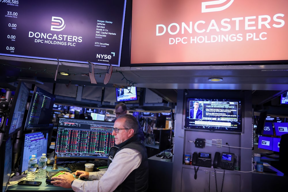 A trader works during the DPC Holdings Ltd. initial public offering (IPO) on the floor of the New York Stock Exchange (NYSE) in New York, US, on Thursday, June 25, 2026. Shares of Doncasters Group, a manufacturer of products for aerospace engines and industrial gas turbines, rose 33% in its US debut after it raised $1.06 billion in an upsized initial public offering and pair of private placements. Photographer: Michael Nagle/Bloomberg A trader works during the DPC Holdings Ltd. initial public offering (IPO) on the floor of the New York Stock Exchange (NYSE) in New York, US, on Thursday, June 25, 2026. Shares of Doncasters Group, a manufacturer of products for aerospace engines and industrial gas turbines, rose 33% in its US debut after it raised $1.06 billion in an upsized initial public offering and pair of private placements. Photographer: Michael Nagle/Bloomberg