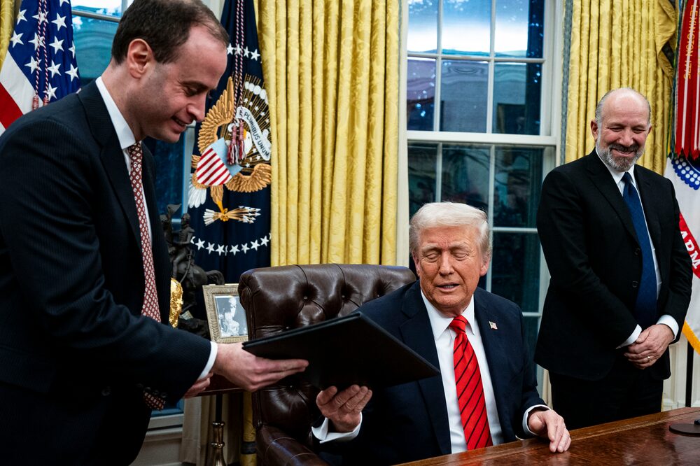 Howard Lutnick, chief executive officer of Cantor Fitzgerald LP and US commerce secretary nominee for US President Donald Trump, right, watches as Will Scharf, White House Staff Secretary, left, hands an executive order to President Donald Trump during a signing ceremony in the Oval Office of the White House in Washington, DC, US, on Monday, Feb. 10, 2025. Trump ordered a 25% tariff on steel and aluminum imports, escalating his efforts to protect politically important US industries with levies hitting some of the country's closest allies. Photographer: Al Drago/Bloomberg Howard Lutnick, chief executive officer of Cantor Fitzgerald LP and US commerce secretary nominee for US President Donald Trump, right, watches as Will Scharf, White House Staff Secretary, left, hands an executive order to President Donald Trump during a signing ceremony in the Oval Office of the White House in Washington, DC, US, on Monday, Feb. 10, 2025. Trump ordered a 25% tariff on steel and aluminum imports, escalating his efforts to protect politically important US industries with levies hitting some of the country's closest allies. Photographer: Al Drago/Bloomberg