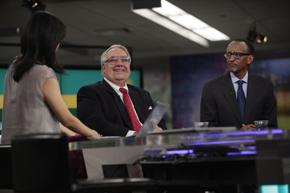 Howard G. Buffett, chairman and chief executive officer of the Howard G. Buffett Foundation and son of billionaire Warren Buffett, center, and Rwandan President Paul Kagame, right, speak during a Bloomberg Television interview with Betty Liu with Betty Liu in New York, U.S., on Wednesday, Dec. 11, 2013. Buffett and Kagame talked about the business environment in Rwanda. Photographer: Victor J. Blue/Bloomberg *** Local Caption *** Howard G. Buffett; Paul Kagame; Betty Liu Howard G. Buffett, chairman and chief executive officer of the Howard G. Buffett Foundation and son of billionaire Warren Buffett, center, and Rwandan President Paul Kagame, right, speak during a Bloomberg Television interview with Betty Liu with Betty Liu in New York, U.S., on Wednesday, Dec. 11, 2013. Buffett and Kagame talked about the business environment in Rwanda. Photographer: Victor J. Blue/Bloomberg *** Local Caption *** Howard G. Buffett; Paul Kagame; Betty Liu