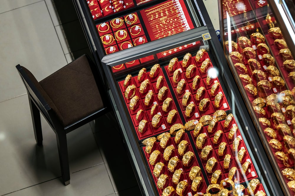 Gold products on display for sale at a trading market near the Shuibei Gold Trading Center in Shenzhen, China, on Thursday, Feb. 5, 2026. China's central bank extended its gold-buying streak to 15 months, underscoring resilient official demand as bullion's record-breaking rally was hit by a sharp market selloff late last month. Photographer: Qilai Shen/Bloomberg Gold products on display for sale at a trading market near the Shuibei Gold Trading Center in Shenzhen, China, on Thursday, Feb. 5, 2026. China's central bank extended its gold-buying streak to 15 months, underscoring resilient official demand as bullion's record-breaking rally was hit by a sharp market selloff late last month. Photographer: Qilai Shen/Bloomberg