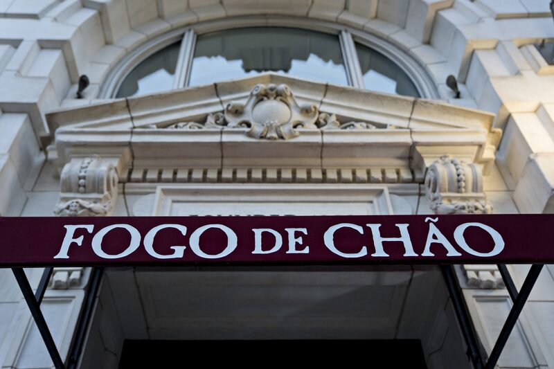Signage hangs outside a Fogo de Chao restaurant in Washington, D.C., U.S., on Thursday, April 23, 2020. Brazilian steakhouse chain Fogo de Chao Inc. was approved for $20 million after receiving two loans through the Paycheck Protection Program (PPP) according to the Wall Street Journal. Photographer: Andrew Harrer/Bloomberg Signage hangs outside a Fogo de Chao restaurant in Washington, D.C., U.S., on Thursday, April 23, 2020. Brazilian steakhouse chain Fogo de Chao Inc. was approved for $20 million after receiving two loans through the Paycheck Protection Program (PPP) according to the Wall Street Journal. Photographer: Andrew Harrer/Bloomberg